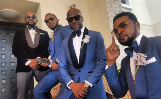 Carefree bestman (2nd from right) posing with the groomsmen